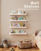Children's room bookshelf, set of 4 white floating shelves, fan-shaped design, suitable for children's bedrooms, nurseries, and playrooms.